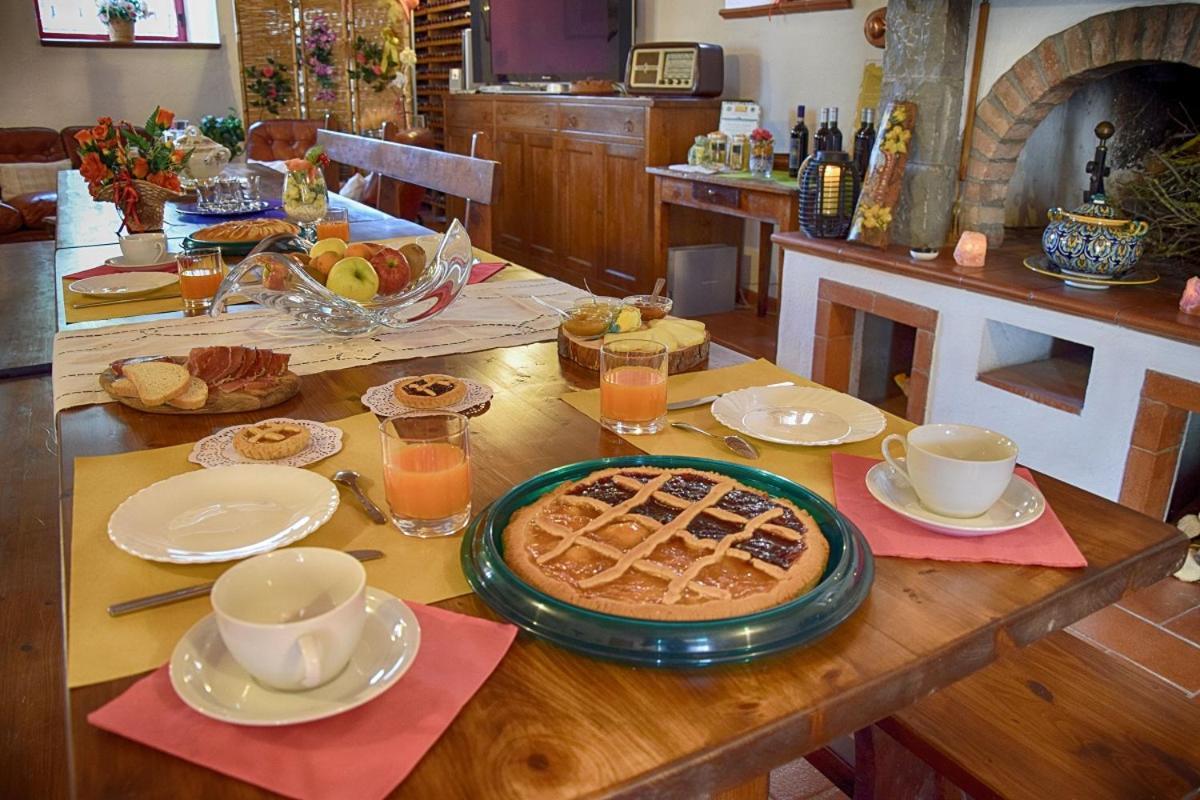 B&B Le Logge Di Sopra Asciano Bagian luar foto