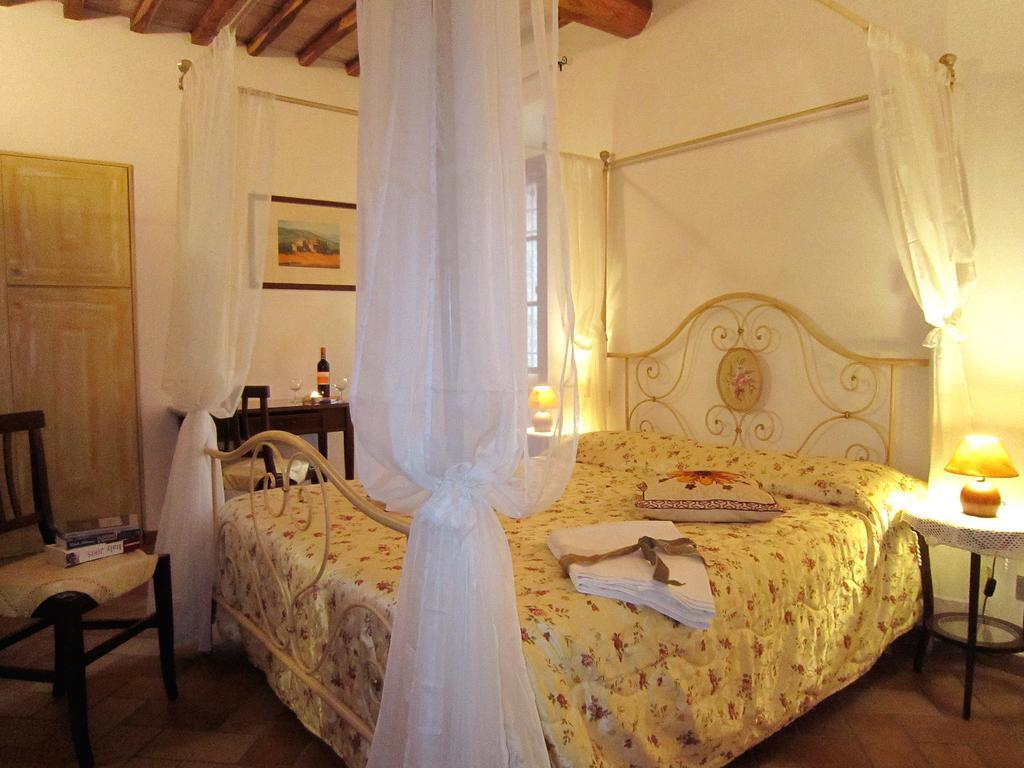 B&B Le Logge Di Sopra Asciano Bagian luar foto